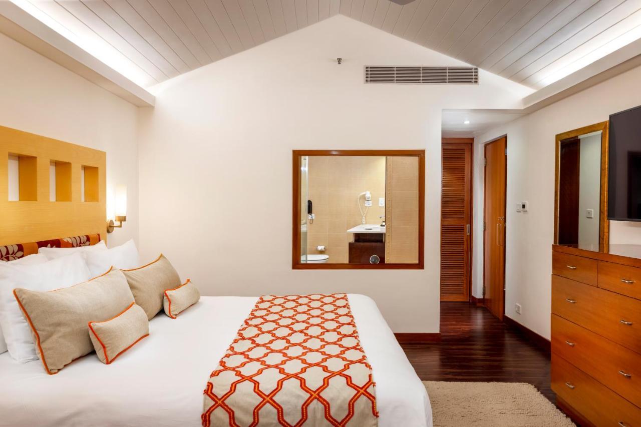 คาราเวลา บีช รีสอร์ต Hotel วาร์กา ภายนอก รูปภาพ A bedroom at the Taj Bengal