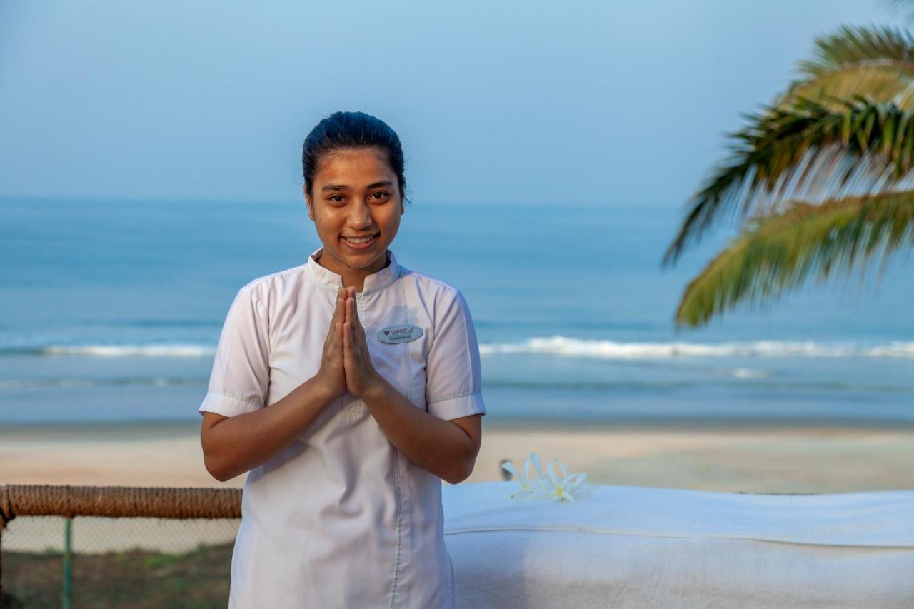 คาราเวลา บีช รีสอร์ต Hotel วาร์กา ภายนอก รูปภาพ A hotel employee in India